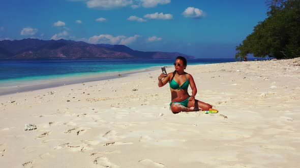 Girls look beautiful on tropical shore beach adventure by blue ocean and white sandy background of G