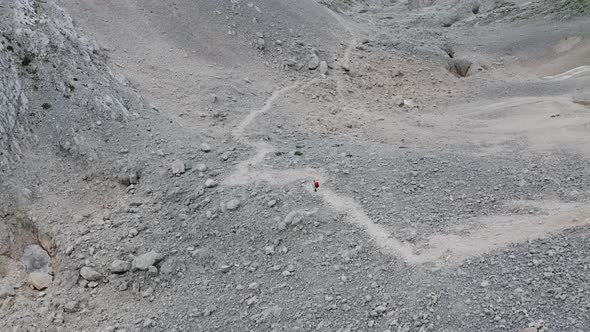 Drone Flight Descending Into Rocky Valley