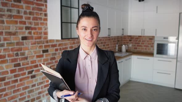 Video of portrait of real estate agent in new apartment. Shot with RED helium camera in 8K.