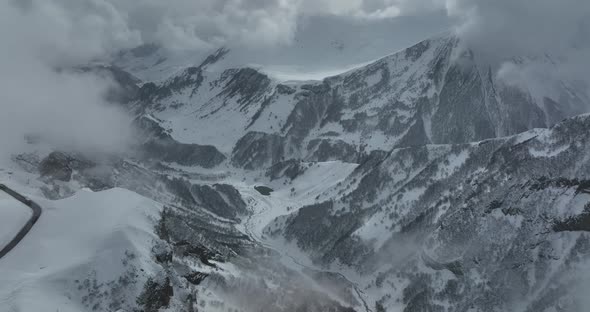 Aerial view of beautiful snowy mountains in Gudauri, Georgia