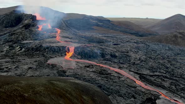 Hot lava flowing from Fagradalsfjall erupting volcano near Grindavik, Iceland