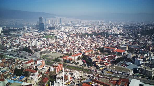 Drone view on poverty slum district and muslim mosque