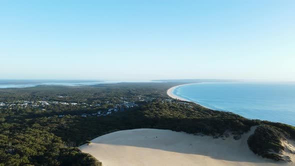 High drone view looking over the Carlo Sand Blow out towards Tin Can Bay Queensland Australia