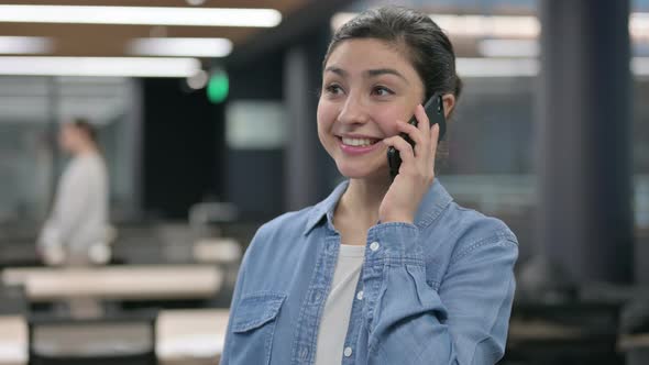 Indian Woman Talking on Phone