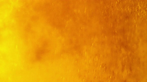 Abstract  golden color background.effect of fresh beer pouring bubbles