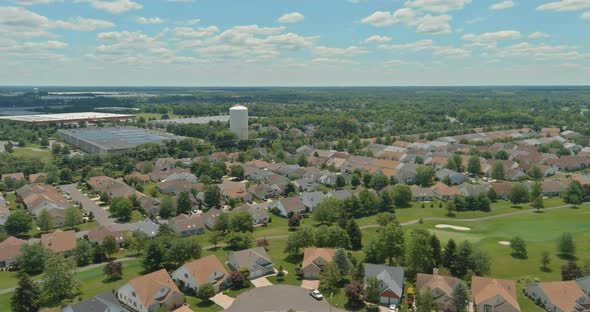 Aerial View Over the Small Town of a Typical Suburb with Small Houses