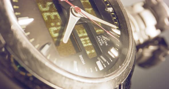 Macro footage of a hand watch with the seconds hand ticking