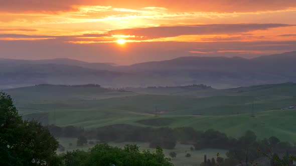 Green Fields of Tuscany at Sunrise