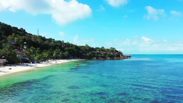 Beautiful turquoise lagoon for snorkel and scuba diving with coral reefs under calm clear water near