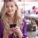 Woman Using Smartphone in Cafe - VideoHive Item for Sale