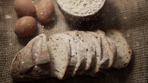 Close Up of Freshly Baked Bread with Eggs and Flour