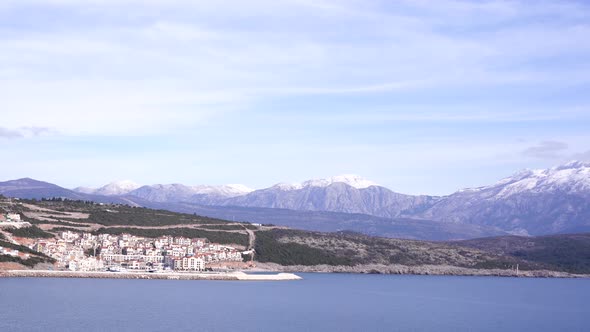 Panorama of the Lustica Bay Against the Background of Snowcapped Mountains