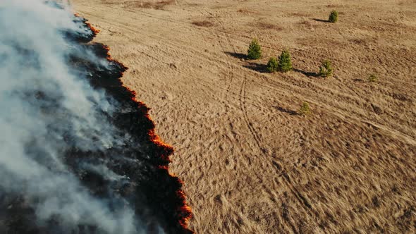Epic Aerial Footage of Smoking Wild Fire