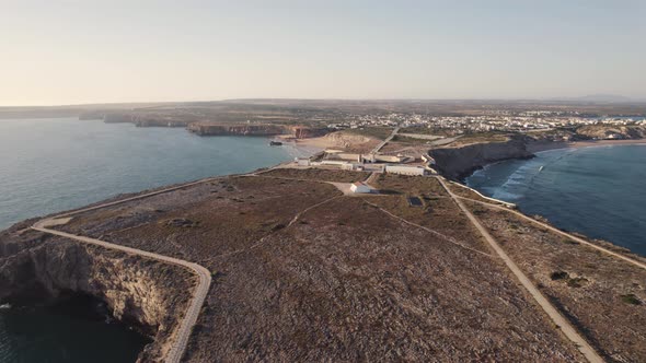 Dolly in aerial view of defensive wall of Sagres fortress, Fortaleza de Sagres Portugal.