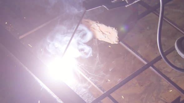 Welder Uses Torch To Make Sparks