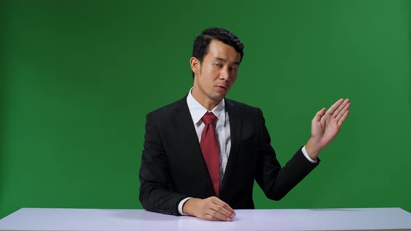 Green Screen Background, Live News Studio With Professional Asian Male Anchor Reporting