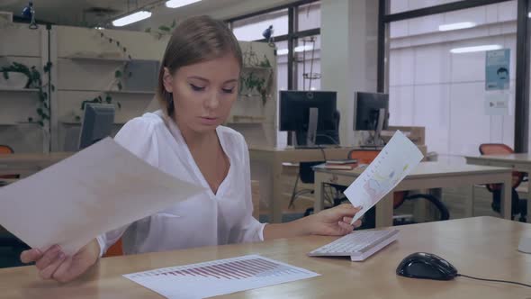 Attractive Caucasian Woman Working in Office