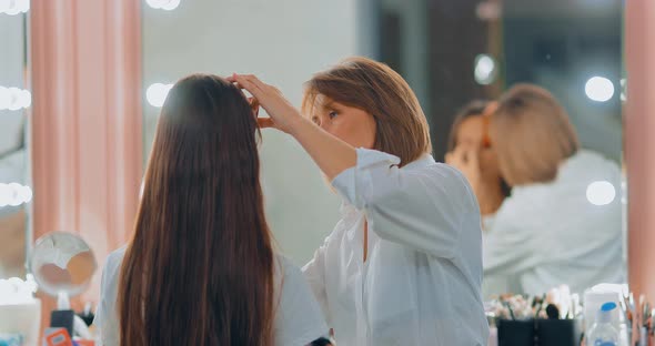Make-up Artist Work in Front of a Large Mirror, Professional Face Makeup in a Beauty Studio