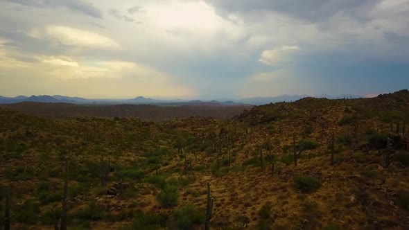 Aerial drone shot of the Arizona Desert, Mountains, and Landscape on a cloudy day.