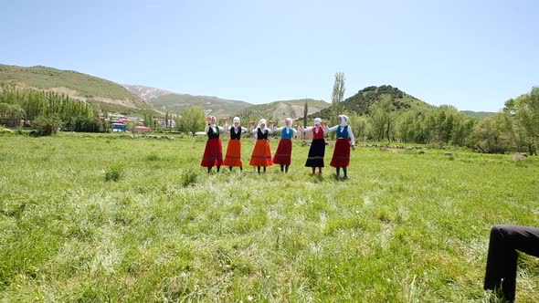 Young Women Traditionally Dancing In Traditional Clothes In Village 2