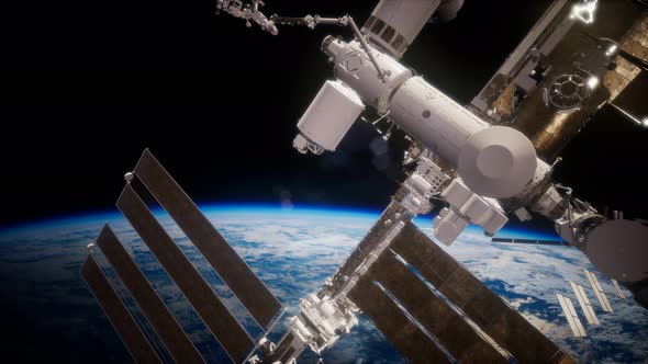 International Space Station in Outer Space Over the Planet Earth alt