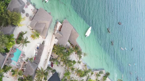 Vertical Video of the Ocean Near the Coast of Zanzibar Tanzania Aerial View