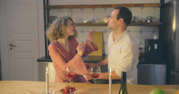 Couple in Love Dancing in Kitchen