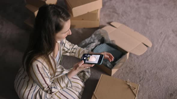 Small Business Owner Photographing Delivery Box Before Shipping, Indoor, Copy Space, 4k