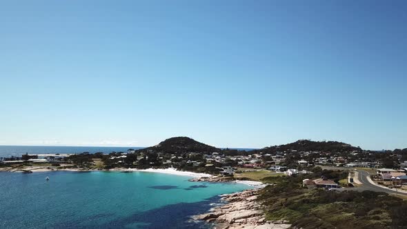 Drone PAN Over Small Holiday Beach And Rural Town In Tasmania Australia