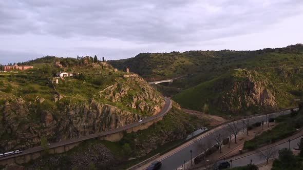 View over the grassy hills ans valley of River Tajo at Toledo, Spain.