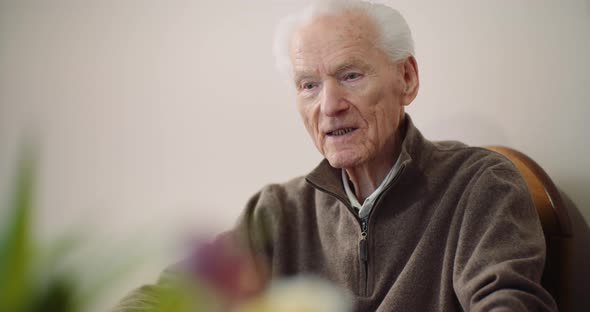 Portrait of Senior Man Talking