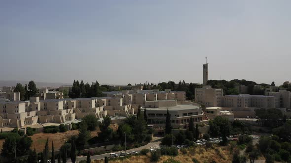 Aerial circle around shot of the Hebrew university on mount Scopus Jerusalem