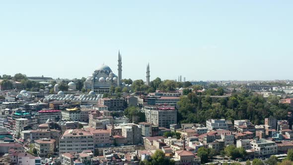 Beautiful Mosque on a Hill in Istanbul on Clear Blue Sky Day with Seagulls in Frame, Aerial View