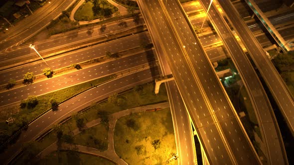 Aerial view shot of fast moving above interchange and multi junction road