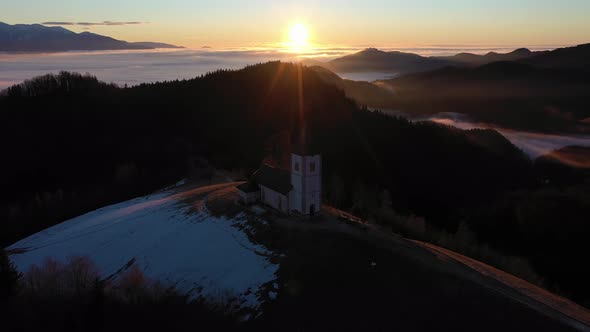 Church of St. Primoz and Felicijan at Sunrise. Julian Alps. Jamnik, Slovenia