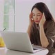 Tired and stressed young Asian woman feel pain eyestrain and rubbing her eyes - VideoHive Item for Sale