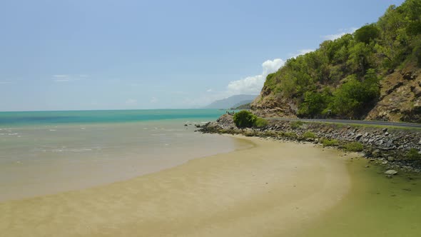 Aerial, Low Tide, Huge Sand Ocean Bed And A Road Near Cairns In Queensland Australia