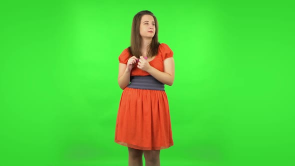 Cute Girl Making Herself Manicure with Pink Nail File. Green Screen
