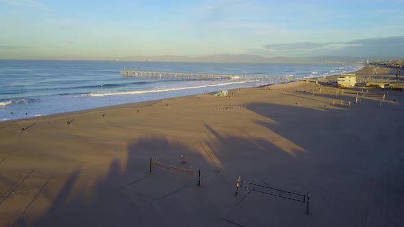 Aerial drone uav view of a volleyball court on the beach and ocean