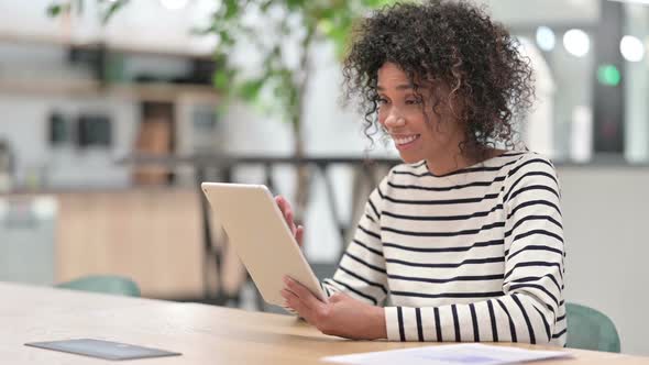 African Woman Doing Video Call on Tablet