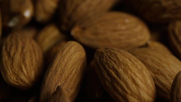 Cinematic, rotating shot of almonds on a white surface - ALMONDS 029