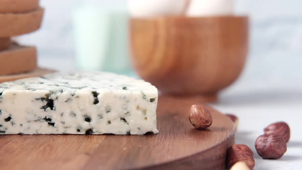 Cheese Milk  Brown Bread and Almond Nut on Table