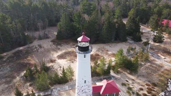 4k drone video of Crisp Point Lighthouse in Michigan during the fall.