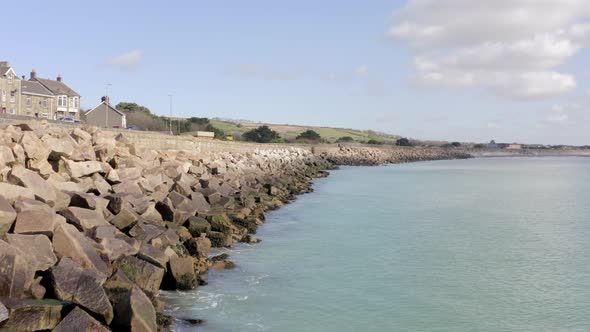 Sea Defence Walls Protecting the Land Along A Coastline