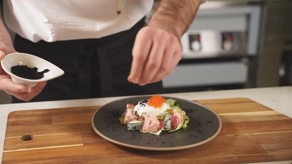 The Chef Decorates the Original Salad for Serving