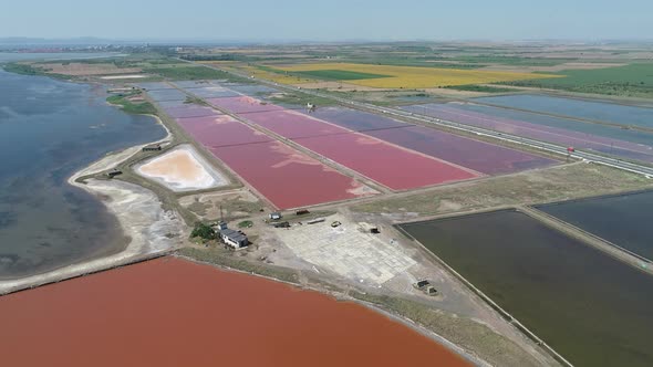 Amazing drone aerial landscape of the beautiful salt ponds, near the beach