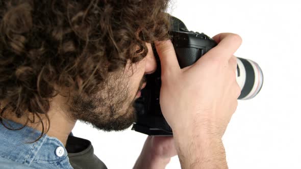 Photographer taking photo with professional digital camera