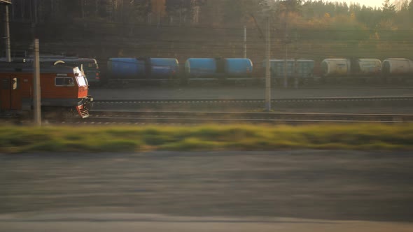 The Train Rides at Sunset