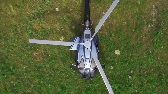 Top View of the Helicopter in the Highlands Landscape. Aerial View