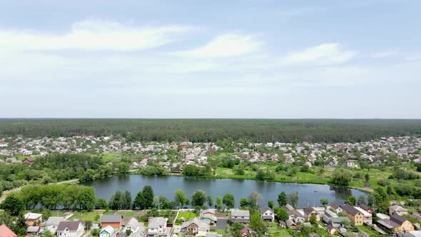 Aerial View of Village and Lake. 